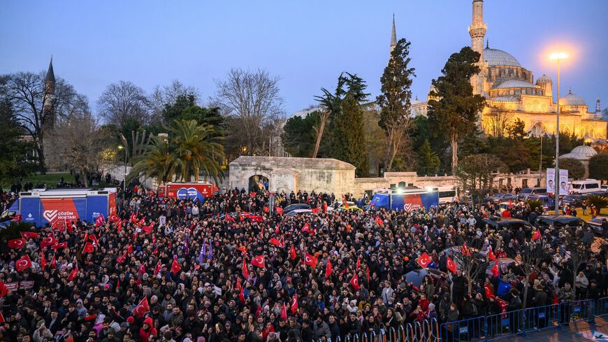 Supporters of Istanbul metropolitan Mayor Ekrem Imamoglu take part in a demonstration outside Istanbul municipality against his detention over a corruption probe in Istanbul on March 19, 2025.