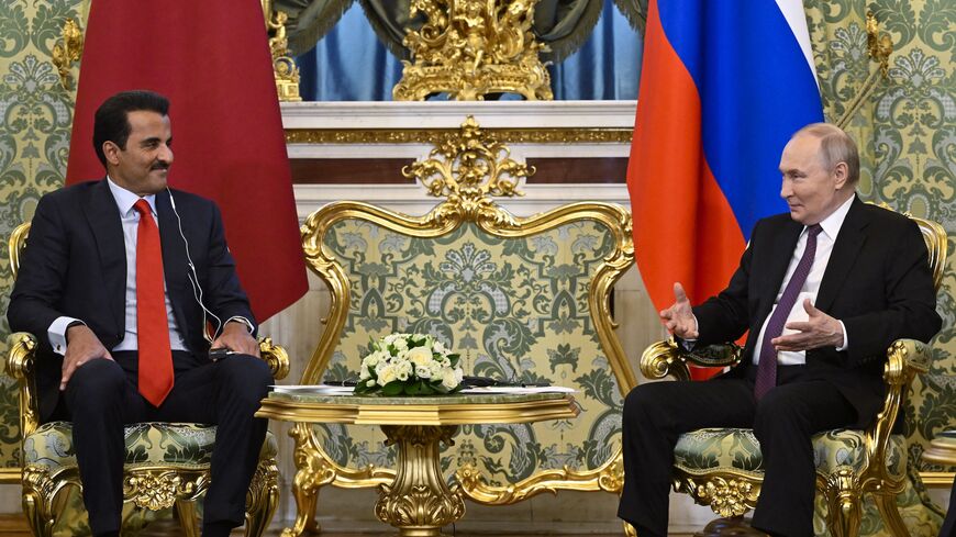 Russian President Vladimir Putin meets with Qatar's Emir Sheikh Tamim bin Hamad al-Thani at the Kremlin in Moscow, on April 17, 2025.