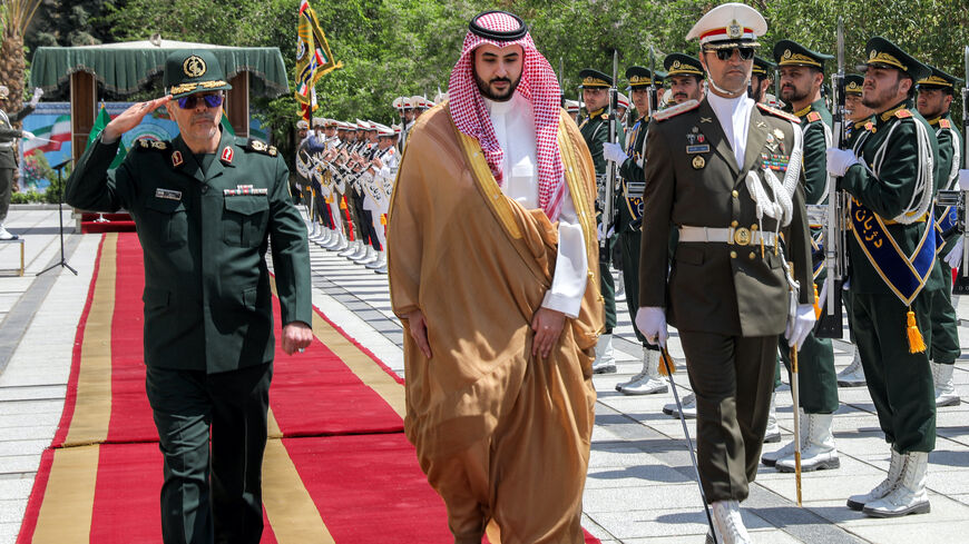 This handout photo made available by the Iranian Army Office on April 17, 2025 shows Iran's Armed Forces Chief of Staff Major-General Mohammed Bagheri (L) receiving Saudi Arabia's Defense Minister Prince Khalid bin Salman (C) in Tehran on April 17, 2025. 