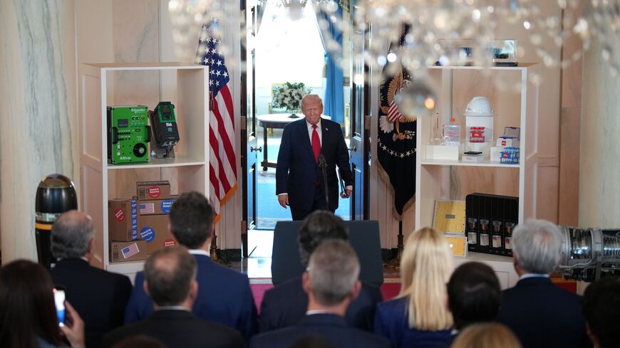 U.S. President Donald Trump arrives in the Cross Hall of the White House to deliver remarks during an event on "Investing in America" on April 30, 2025 in Washington, DC