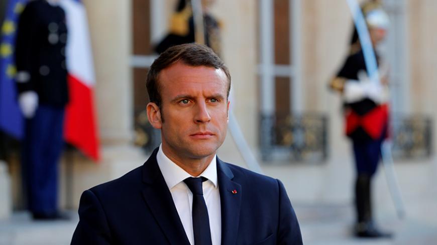 French President Emmanuel Macron attends a meeting at the Elysee Palace in Paris, France May 21, 2017. REUTERS/Philippe Wojazer - RTX36W98