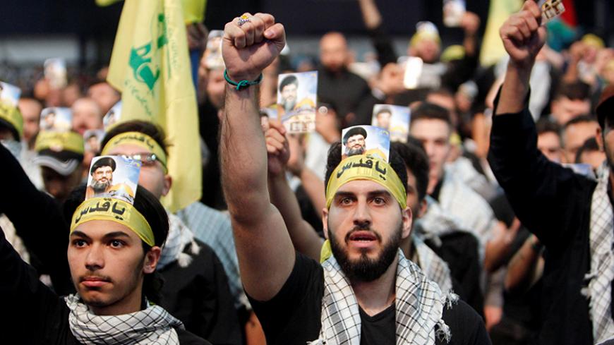 Supporters of Lebanon's Hezbollah leader Sayyed Hassan Nasrallah chant slogans and gesture during a rally marking Al-Quds day in Beirut's southern suburbs, Lebanon June 23, 2017. REUTERS/Aziz Taher - RTS18DLL
