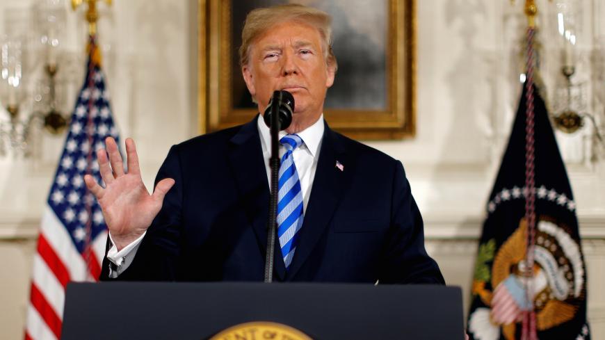 U.S. President Donald Trump announces his intention to withdraw from the JCPOA Iran nuclear agreement during a statement in the Diplomatic Room at the White House in Washington, U.S. May 8, 2018. REUTERS/Jonathan Ernst - RC1AB8675B40