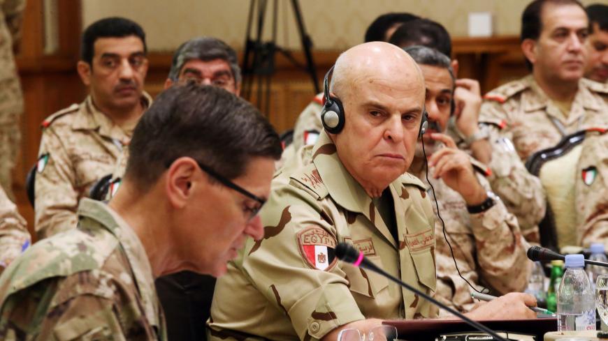 Egyptian armed forces Chief of Staff Mohamed Farid Hegazy (R) looks on as Joseph Leonard Votel, Commander of United States Central Command, speaks during a meeting with the Gulf cooperation council's armed forces chiefs of staff in Kuwait City on September 12, 2018. - Gulf Arab army chiefs, including Qatar's military commander, are meeting with US Central Command officials for talks on defence cooperation. (Photo by Yasser Al-Zayyat / AFP) (Photo credit should read YASSER AL-ZAYYAT/AFP/Getty Images)