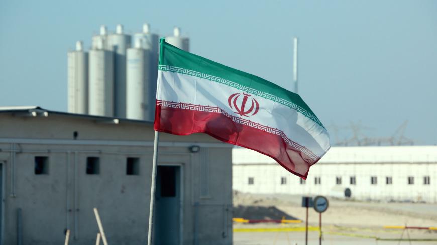 A picture taken on November 10, 2019, shows an Iranian flag in Iran's Bushehr nuclear power plant, during an official ceremony to kick-start works on a second reactor at the facility. - Bushehr is Iran's only nuclear power station and is currently running on imported fuel from Russia that is closely monitored by the UN's International Atomic Energy Agency. (Photo by ATTA KENARE / AFP) (Photo by ATTA KENARE/AFP via Getty Images)