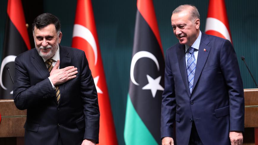 Turkish President Recep Tayyip Erdogan (R) and Libyan Prime Minister Fayez al-Sarraj (L) hold a joint press conference at the Presidential Complex in Ankara on June 4, 2020. (Photo by Adem ALTAN / AFP) (Photo by ADEM ALTAN/AFP via Getty Images)