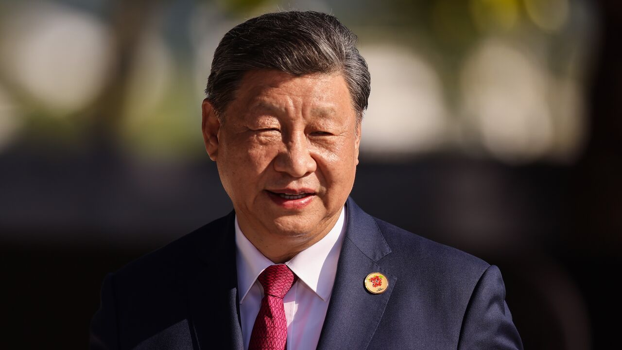 Xi Jinping president of China waves during the first working session as part of the G20 summit 2024 at Museu de Arte Moderna on Nov. 18, 2024, in Rio de Janeiro, Brazil.