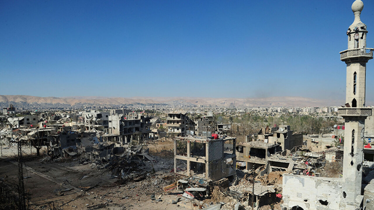 A view shows a part of the al-Dukhaneya neighborhood near Damascus after soldiers loyal to Syria's President Bashar al-Assad took control of it from rebel fighters A view shows a part of the al-Dukhaneya neighborhood near Damascus after soldiers loyal to Syria's President Bashar al-Assad took control of it from rebel fighters, October 6, 2014, in this handout released by Syria's national news agency SANA. REUTERS/SANA/Handout via Reuters (SYRIA - Tags: CIVIL UNREST POLITICS CONFLICT TPX IMAGES OF THE DAY) ATTENTION EDITORS - THIS PICTURE WAS PROVIDED BY A THIRD PARTY. REUTERS IS UNABLE TO INDEPENDENTLY VERIFY THE AUTHENTICITY, CONTENT, LOCATION OR DATE OF THIS IMAGE.