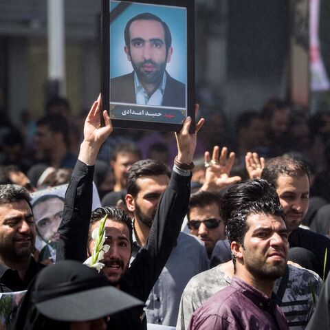 People attend the funeral of the victims who were killed on the June 7 attack at the Iranian parliament and Ayatollah Khomeini's mausoleum, in Tehran, Iran June 9, 2017. TIMA via REUTERS  ATTENTION EDITORS - THIS IMAGE WAS PROVIDED BY A THIRD PARTY. FOR EDITORIAL USE ONLY? - RTX39TEM